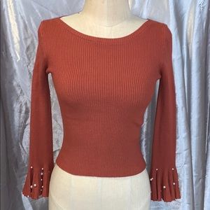 Sweater with pearl embellishment